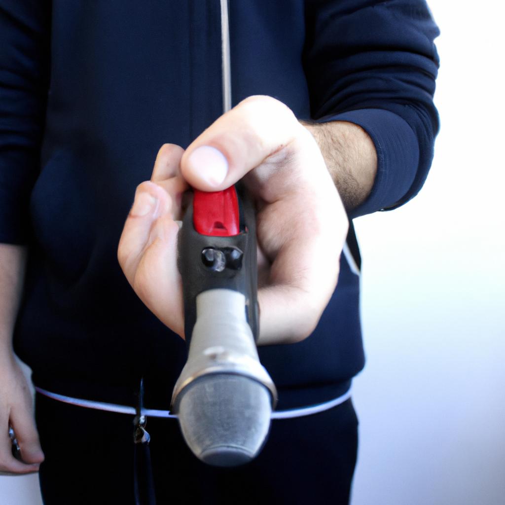 Person holding a radio microphone